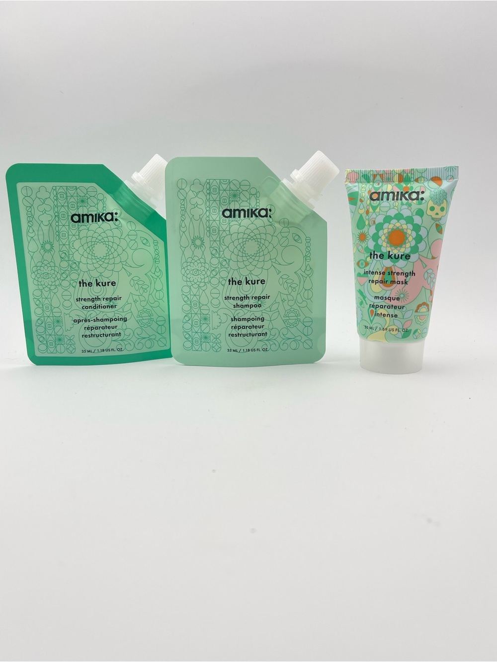 amika The Kure Strength Repair Shampoo & Conditioner Trio